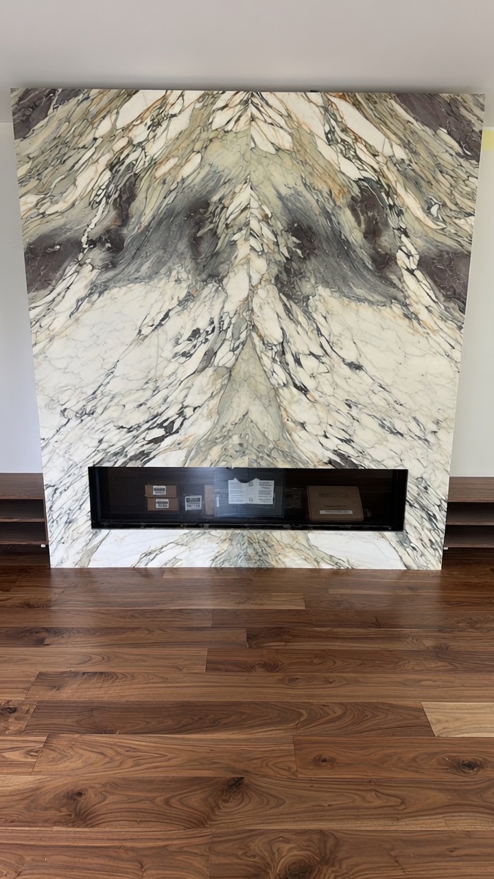 Book-matched marble fireplace surround